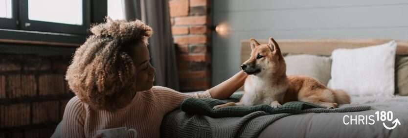 Woman petting dog